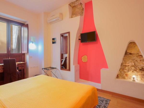 Le Suite Sul Corso : photo 4 de la chambre chambre triple