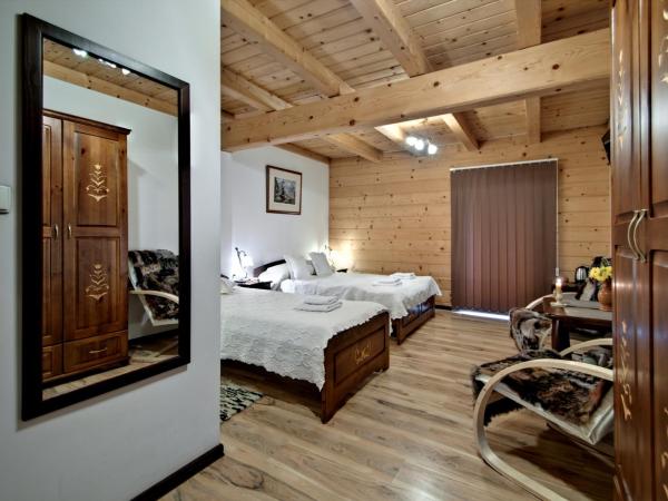 Magnat Inn & Sauna & Relax : photo 1 de la chambre chambre triple - vue sur jardin