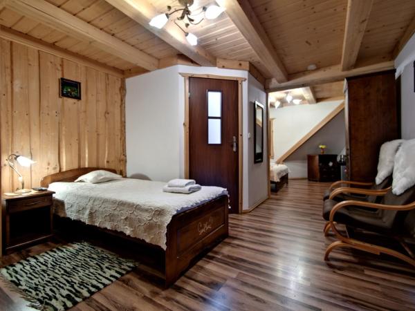 Magnat Inn & Sauna & Relax : photo 2 de la chambre chambre triple avec balcon