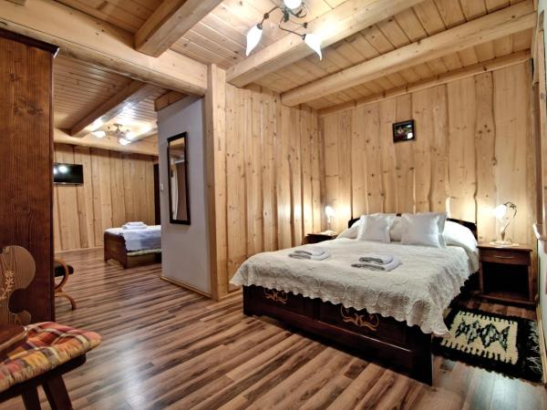 Magnat Inn & Sauna & Relax : photo 1 de la chambre chambre triple avec balcon