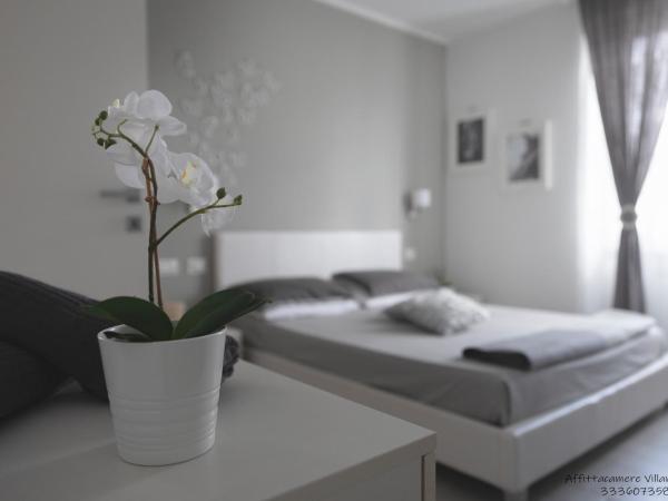 Affittacamere Villa Marcella : photo 4 de la chambre chambre double - vue sur jardin