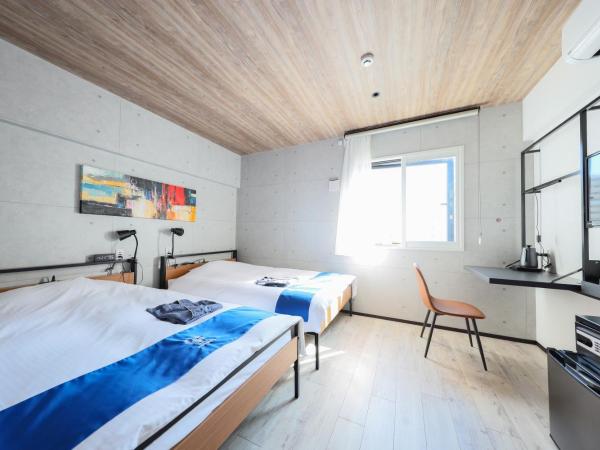 Hotel Potmum Sapporo : photo 1 de la chambre chambre lits jumeaux spacieuse