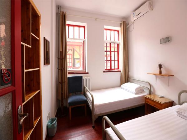 Wheat Youth Hostel Qingdao : photo 3 de la chambre chambre lits jumeaux standard avec salle de bains commune