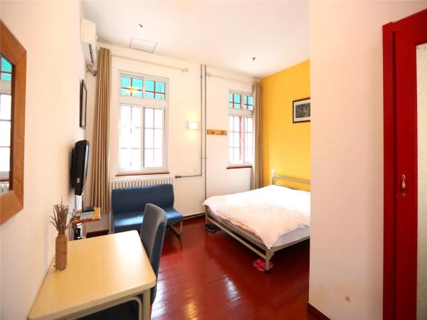 Wheat Youth Hostel Qingdao : photo 1 de la chambre chambre supérieure lit queen-size