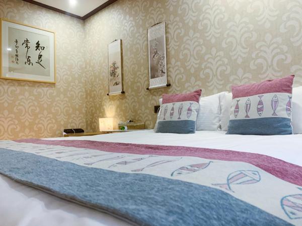 Suzhou Jade Snow Lodge : photo 6 de la chambre chambre lit king-size - vue sur rivière