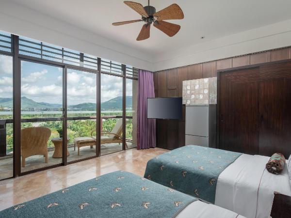 Yalong Bay Mangrove Tree Resort : photo 2 de la chambre suite familiale avec vue sur le jardin