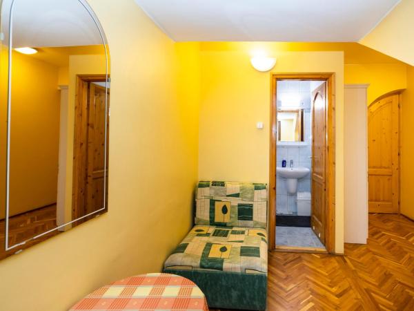 Cecey Vendégház : photo 4 de la chambre chambre triple