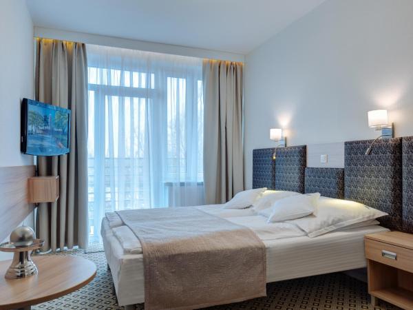 Ośrodek Perełka : photo 3 de la chambre chambre deluxe