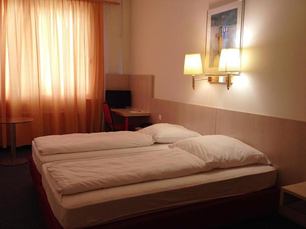 Hotel New Fair Munich Messe : photo 1 de la chambre chambre lits jumeaux
