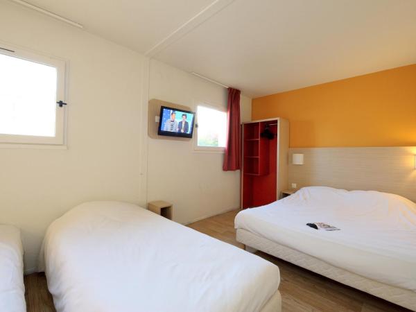 Hôtel Kennedy Parc des Expositions : photo 9 de la chambre chambre quadruple (4 lits simples)