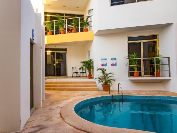 Sunset Isla Mujeres : photo 4 de la chambre appartement - vue sur mer