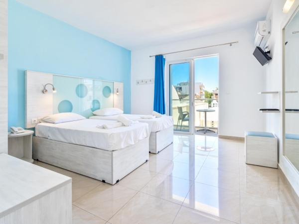 Santa Maria City Hotel : photo 2 de la chambre chambre triple avec balcon