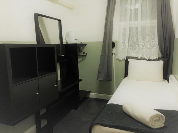 Plaza London Hotel : photo 1 de la chambre chambre simple avec salle de bains extérieure privative