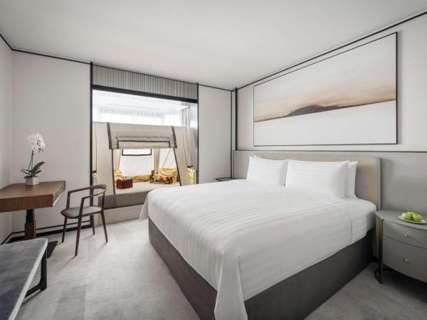 Shangri-La Singapore : photo 4 de la chambre hébergement familial lit king-size deluxe - aile tour