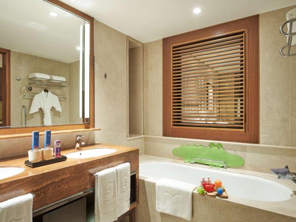 Shangri-La Singapore : photo 6 de la chambre hébergement familial lit king-size deluxe avec terrasse - aile jardin