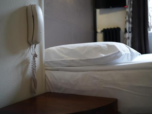 Hotel De Quebec : photo 6 de la chambre chambre simple