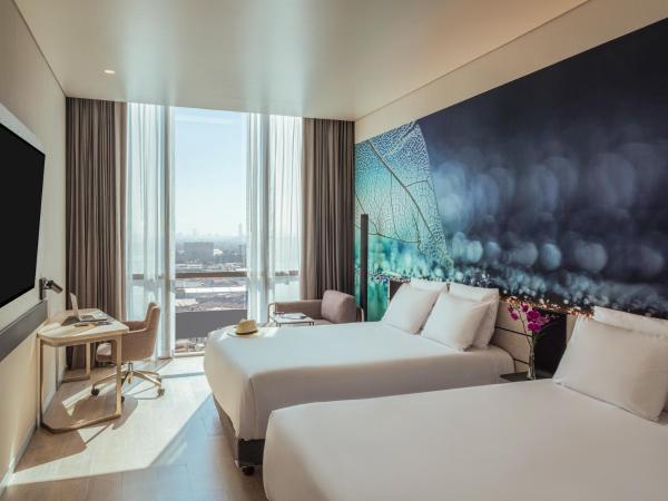 Novotel Mexico City Toreo : photo 1 de la chambre chambre double supérieure avec deux lits doubles