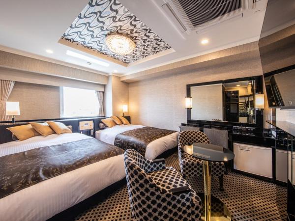 APA Hotel Hakataeki Chikushiguchi : photo 1 de la chambre chambre lits jumeaux deluxe avec accès aux bain public (tour centrale) - non-fumeurs