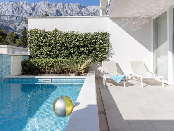 Romana Beach Resort : photo 1 de la chambre suite junior avec piscine privée - vue sur montagne