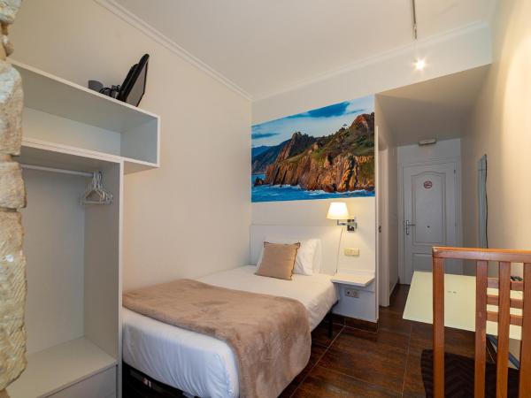 Pension Aida : photo 1 de la chambre chambre simple avec salle de bains privative