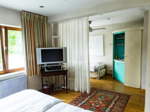 B&B Le Coquin : photo 1 de la chambre chambre triple - vue sur jardin