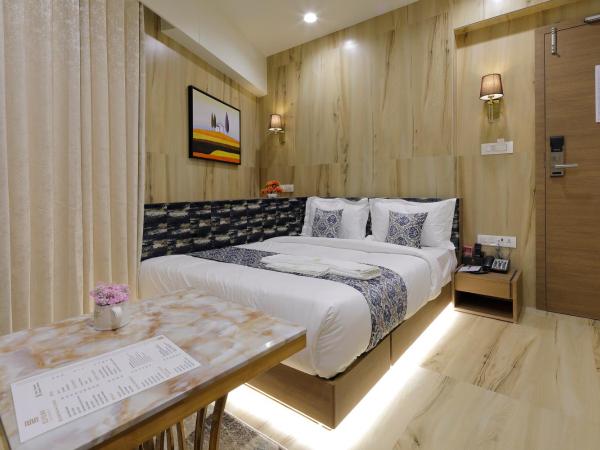 Hotel Elysian Residency : photo 1 de la chambre chambre double standard