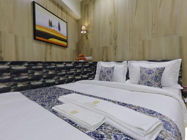 Hotel Elysian Residency : photo 2 de la chambre chambre double standard