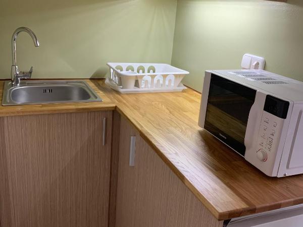 Hollik Apartmanház : photo 10 de la chambre superior studio with balcony and airconditioning