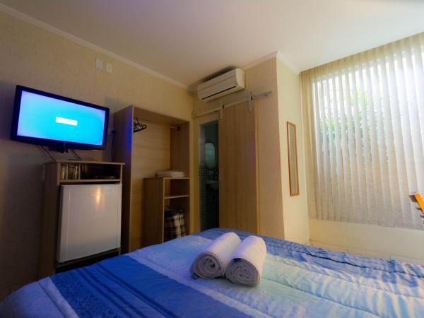 Hotel Estação Paraíso - ao lado do Metrô Paraíso e 600m da Av Paulista : photo 3 de la chambre chambre quadruple