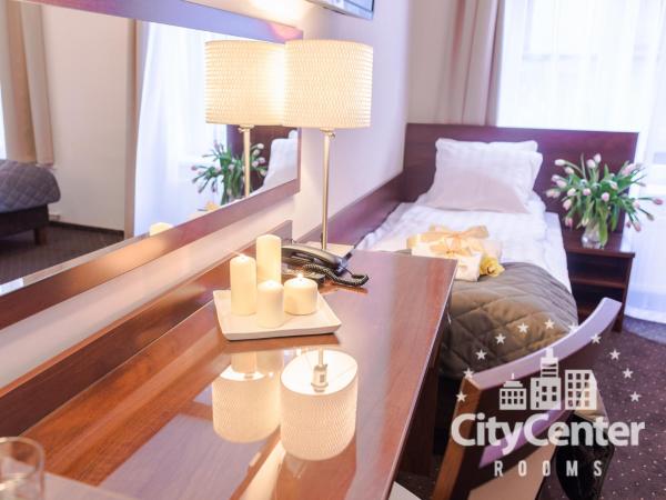 City Center Rooms Piotrkowska 91 : photo 10 de la chambre chambre double ou lits jumeaux