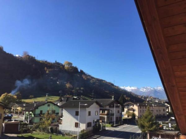 Sottosopra Alps Apartments & Rooms : photo 1 de la chambre appartement avec vue sur la montagne