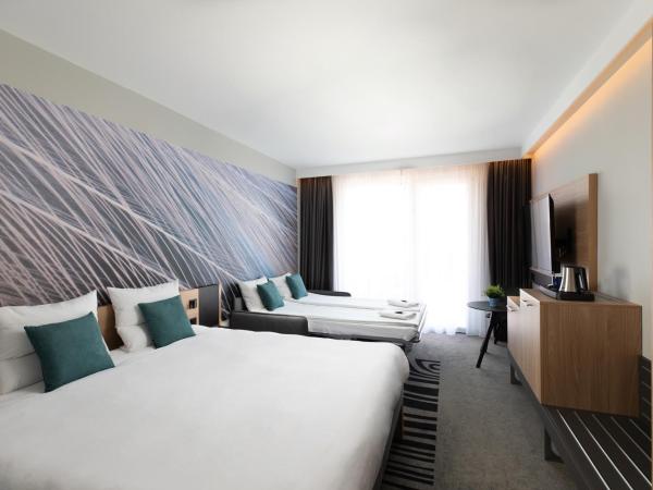 Novotel Szeged : photo 6 de la chambre chambre double supérieure avec canapé