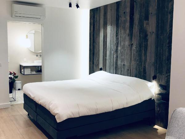 Suites Le Porte-Bonheur : photo 5 de la chambre suite - vue sur jardin