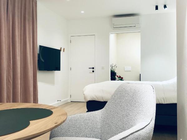 Suites Le Porte-Bonheur : photo 8 de la chambre suite - vue sur jardin