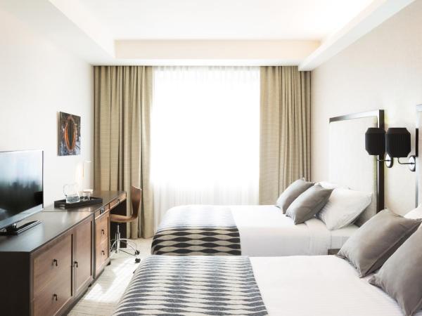 Leon Hotel LES : photo 1 de la chambre studio avec 2 lits doubles