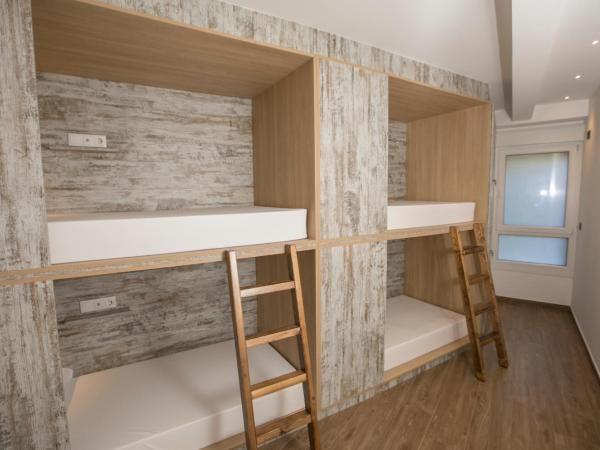THOSTEL : photo 2 de la chambre lit dans dortoir mixte de 4 lits