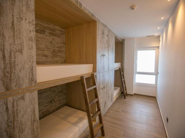 THOSTEL : photo 1 de la chambre lit dans dortoir mixte de 4 lits