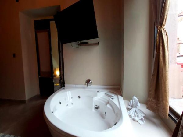 Independencia Dos 7 Hotel Boutique : photo 8 de la chambre suite lit king-size