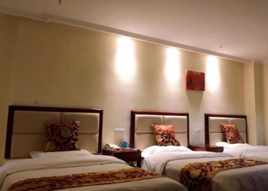 GreeTree Inn JiangSu Suzhou Taiping High-speed North Station Express Hotel : photo 1 de la chambre chambre triple