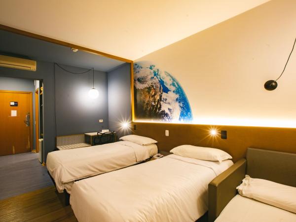Hotel Euro Suíte Curitiba Batel By Nacional Inn : photo 5 de la chambre appartement standard avec lits jumeaux