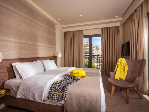 Metropole Urban Hotel : photo 3 de la chambre chambre de luxe avec balcon - vue sur ville