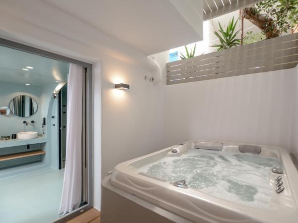 Argo Boutique Hotel : photo 5 de la chambre suite orpheus en demi sous-sol avec hammam et jacuzzi extérieur