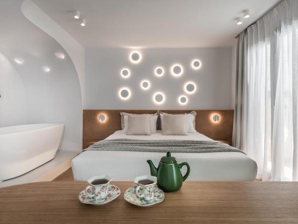 Argo Boutique Hotel : photo 2 de la chambre suite orpheus en demi sous-sol avec hammam et jacuzzi extérieur