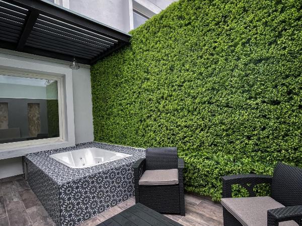 Fato Hotel : photo 3 de la chambre suite avec baignoire spa