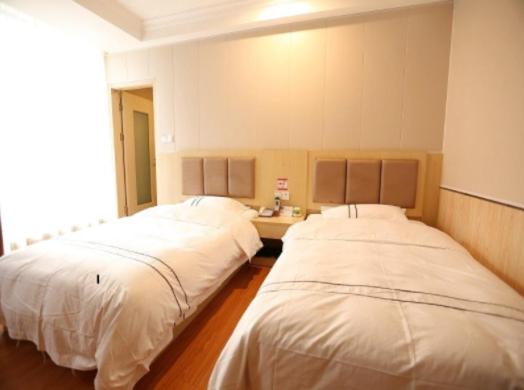 Shell Shanghai Qingpu District National Convention And Exhibition Center Xinfeng Middle Road Hotel : photo 2 de la chambre chambre lits jumeaux
