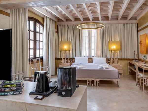 10GR Boutique Hotel & Wine Bar : photo 4 de la chambre suite exécutive rhodes avec bain à remous