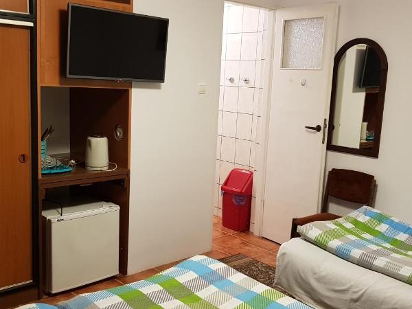 Wynajem pokoi : photo 6 de la chambre chambre double - vue sur jardin