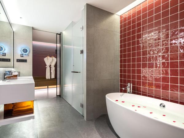 Novotel Dongguan Songshan : photo 2 de la chambre suite deluxe avec lit king-size