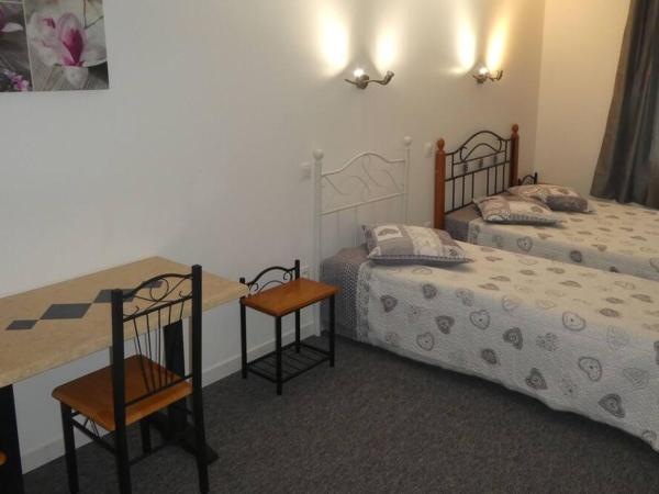 eTANIT ! Béziers Plein Centre - 1mn Du Bus, De la Gare du Train et liaison Aéroport -Chambres Climatisées -Spacieuses Amenagees pour Singles, Couple, et ou Familles -Parking a vélos -Consigne : photo 2 de la chambre chambre quadruple premium