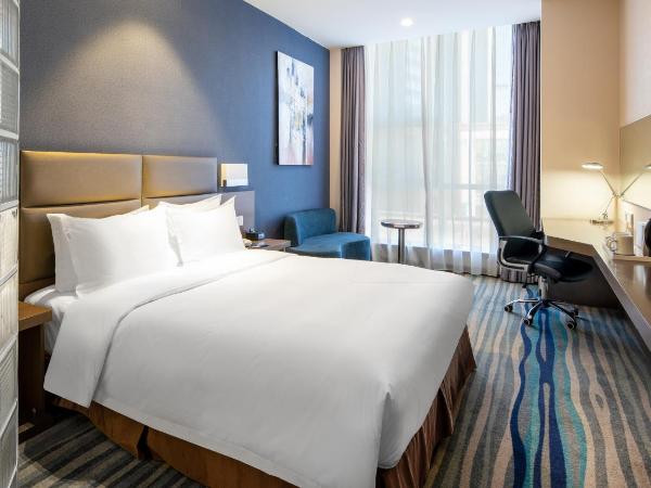 Holiday Inn Express Shenyang North Station, an IHG Hotel : photo 1 de la chambre standard queen room with extra floor space